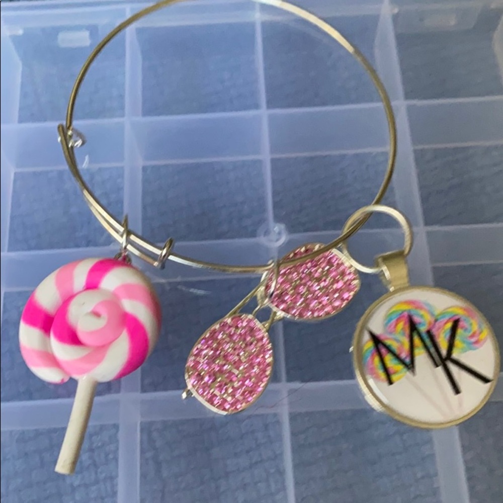 Silver plated bangle with charms